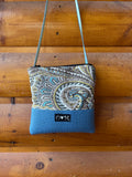 blue OlovesM Crossbody bag with paisley pattern and yoga mat bottom upcycled yoga mat material. Handmade in Colorado